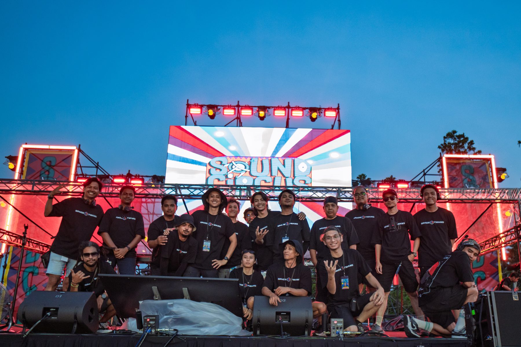Full STP crew in front of the stage screen